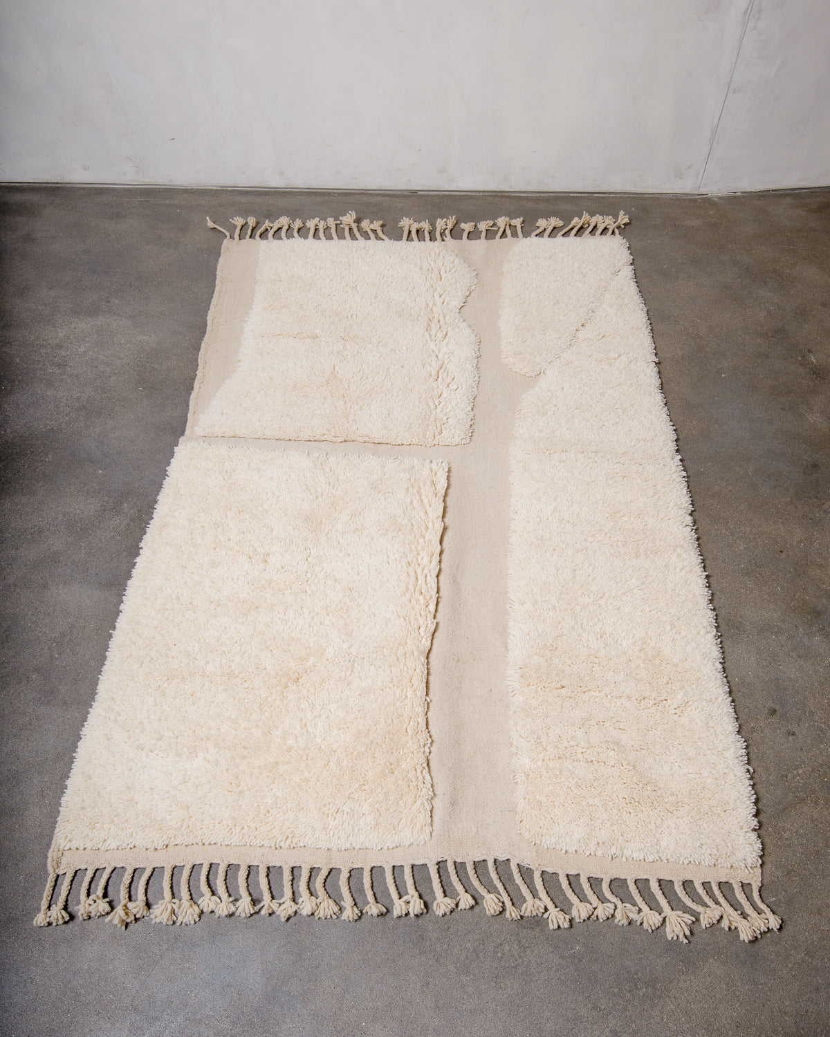 Modern, designer, handcrafted Berber rug from Morocco. Beniourain carpet with beautiful colours and patterns and fluffy wool texture.